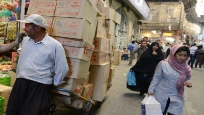 روحاني يقلل من آثار "كورونا" على الاقتصاد الإيراني