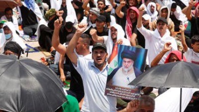 ميليشا "كتائب حزب الله" تهدد بالنزول إلى الشارع