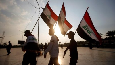 العراق.. المتظاهرون يؤكدون تمسكهم بالسلمية ويكنسون "الخميني" بالبصرة