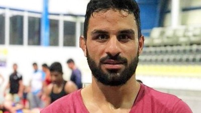 ناشطون يطلقون حملة للإفراج عن شقيقي المصارع الذي أعدمته إيران