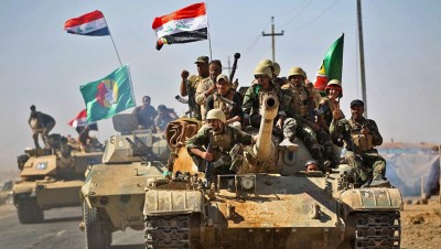 العراق.. "الحشد الشعبي" يكذّب الرواية الأمريكية حول ضرب مواقعه في سوريا